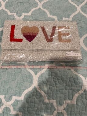 Francesca's Collections White Beaded 'LOVE' Clutch with Multicolor Lettering